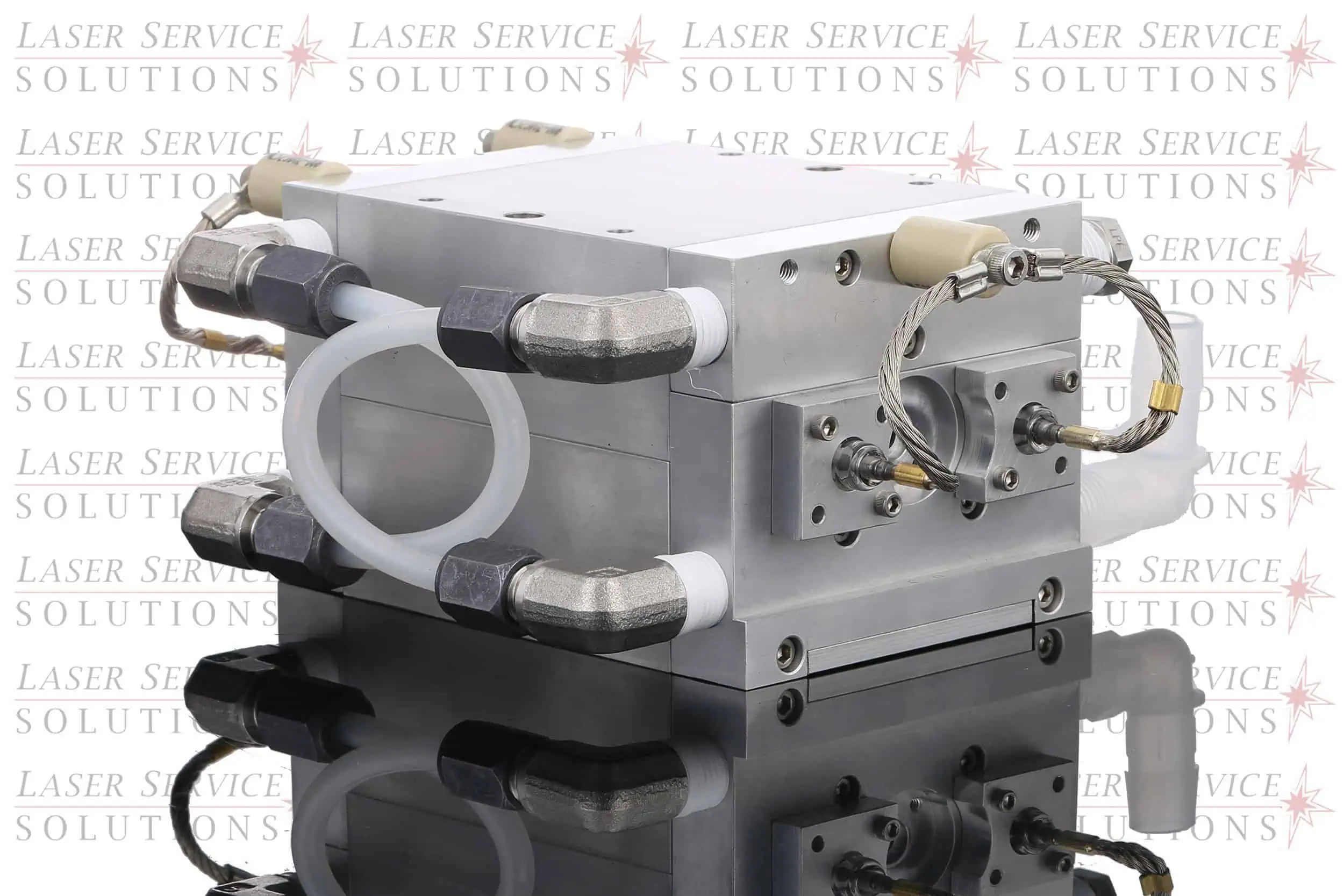 Elite+ Yag Pump Chamber featuring hoses, cables, and fittings, displayed on a reflective surface. The background displays repeated gray and red Laser Service Solutions logos.