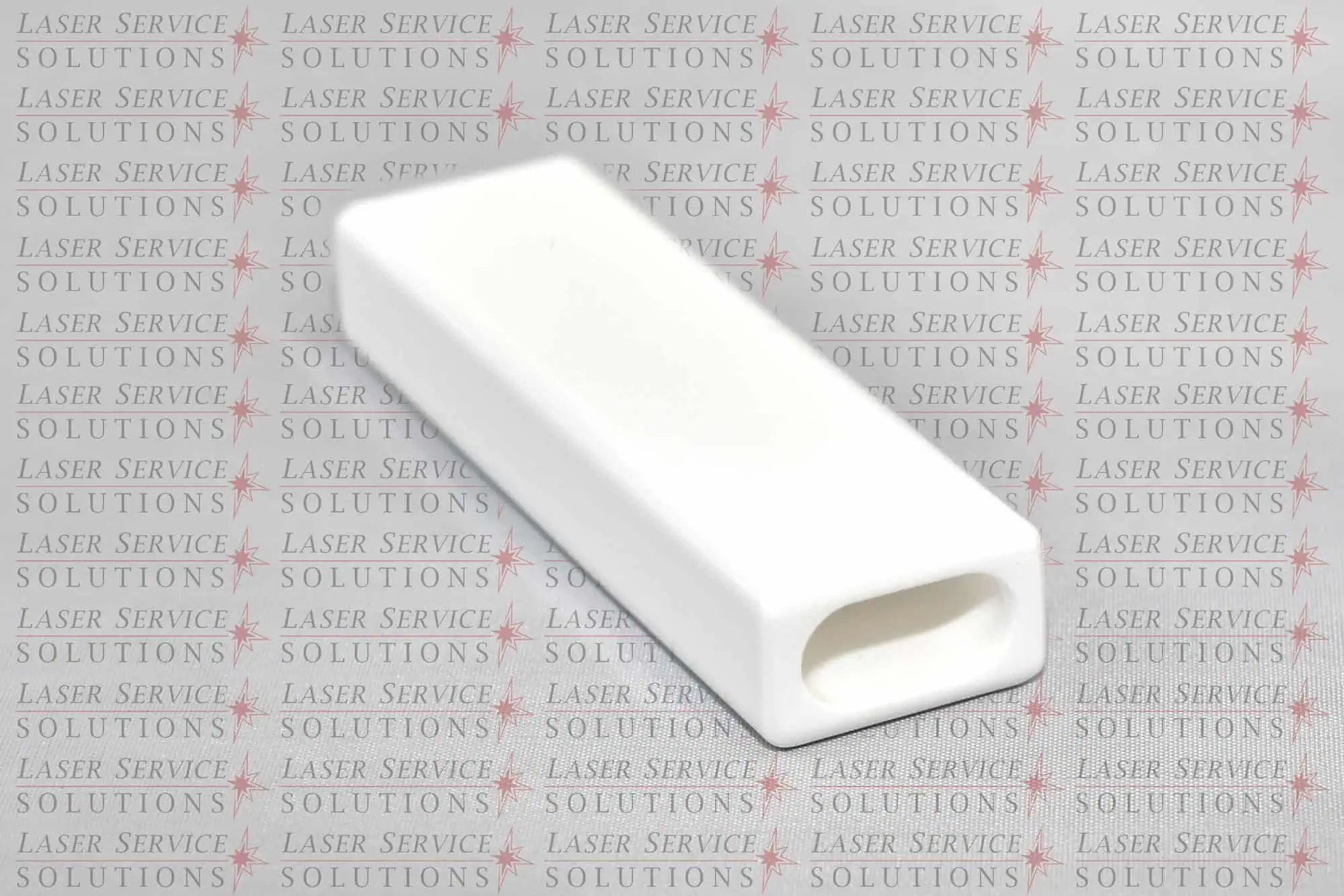 A Harmony Pixel/Pro Reflector, featuring a white rectangular ceramic design with a hollowed section, is displayed against a background patterned with the words “Laser Service Solutions” in red and gray text.