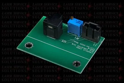 The Candela MGY DCD Bubble Sense PCB is a green printed circuit board featuring two black connectors and a blue adjustable potentiometer, shown against a black background with “Laser Service Solutions” repeatedly displayed in red and white text.