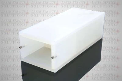 A white rectangular plastic Elite Coolant Reservoir with an open front, two metal screws on the side, and a reflective black surface beneath. The background faintly features the Laser Service Solutions logo repeated.