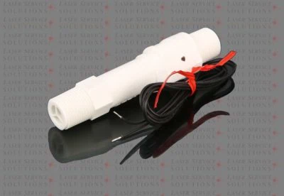 The Elite Flow Switch is a white plastic flow sensor with threaded ends and two attached black wires, each secured with a red twist tie, shown on a reflective black surface.