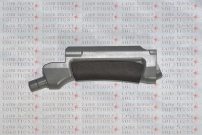 A metallic industrial part with a black grip is displayed on a background patterned with the words LASER SERVICE SOLUTIONS in red and grey.